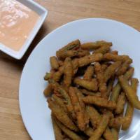 Green Bean Fries · Basket of lightly coated green beans served with chipotle ranch sauce.