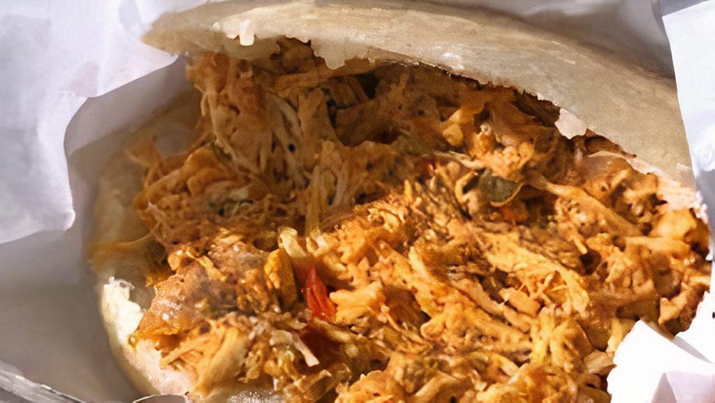 Grilled Chicken Arepa Plate · Grilled Chicken Two Arepas, Black Bean Chili, Grilled Peppers and Onions