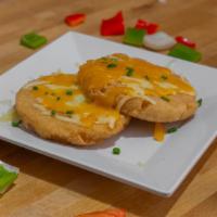 Cheesy Arepas · Two Arepas with jack and cheddar cheese