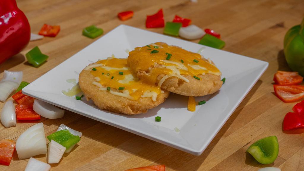 Cheesy Arepas · Two Arepas with jack and cheddar cheese