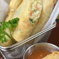 Thai Spring Rolls · Deep-fried mixed vegetable roll with glass noodle. Served with sweet chili sauce.