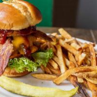 Bacon Bbq Burger · 1/3 lb, two pieces. Crispy bacon, Cheddar cheese, BBQ sauce, and an onion ring. Comes on a p...