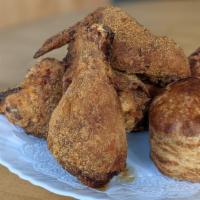 Quarter Bird (White Or Dark) · Breast and wing (white) or thigh and drum (dark) with one angel biscuit and sorghum butter.