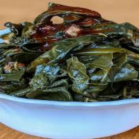 Bacon-Braised Collard Greens · Sauvie Island collard greens cooked within an inch of their life and finished with bourbon b...