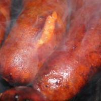 2 Hot Links (Pork) · Served with buns and THE PLUGG BBQ Sauce.