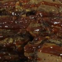 (1 Lb) Sliced Brisket  · Served with THE PLUGG BBQ Sauce