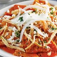 Chilaquiles · Soft corn tortilla chips topped with salsa and cheese, choice of salsa red or green.