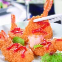 Fried Shrimp (9 Pieces) · Breadcrumb breaded shrimp deep fried served with a side of sweet & sour sauce.