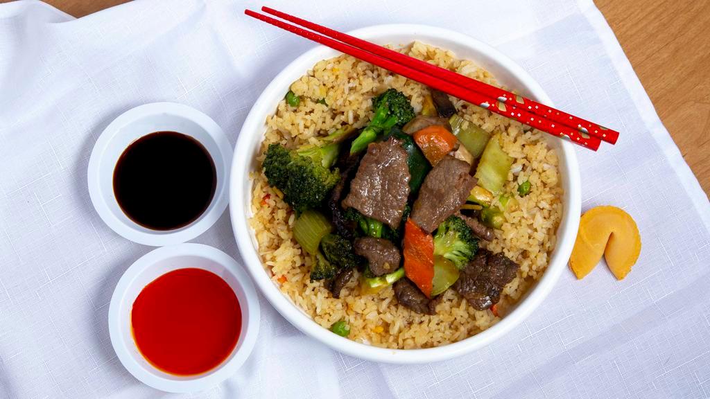 Mongolian Beef · Hot & Spicy beef, green and white onions, mixed with fresh vegetables.