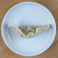 Steamed Chicken Dumpling (6 Pcs) · Chicken, vegetables, and spices in a wheat wrapper


---
Contains: meat, wheat, soy, sesame