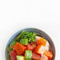 Poke · Tuna, salmon, crab salad, seaweed salad, cucumber, masago choice of sauce: yuzu (Japanese ci...