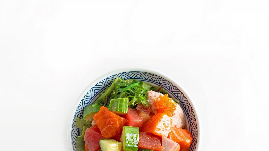 Poke · Tuna, salmon, crab salad, seaweed salad, cucumber, masago choice of sauce: yuzu (Japanese citrus) soy or sweet spicy. Bowl or salad.