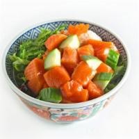Salmon Poke · Salmon, crab salad, seaweed salad, cucumber, masago choice of sauce: yuzu (Japanese citrus) ...