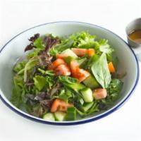 Green Salad (V) · Vegetarian. Mixed greens, tomato, cucumber, ginger dressing.