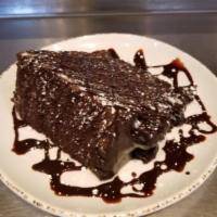 Chocolate Cake · Colossal...Layer upon layer of dark, moist chocolate cake & silky, smooth chocolate filling....