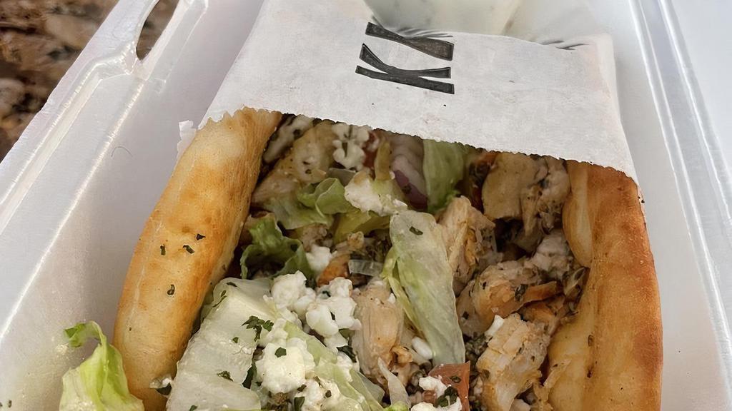 Chicken Gyros · Homemade chicken breast meat pita with lettuce, tomato, onion and feta cheese with homemade tzatziki sauce on the side.