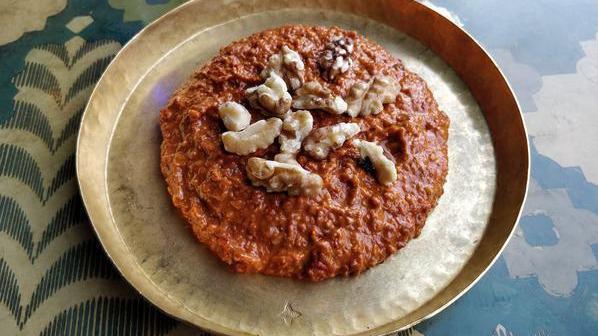 Muhammara · Popular. Vegetarian. Walnut, pepper paste, cumin, garlic, pomegranate molasses, breadcrumbs. (served with 3 pita)