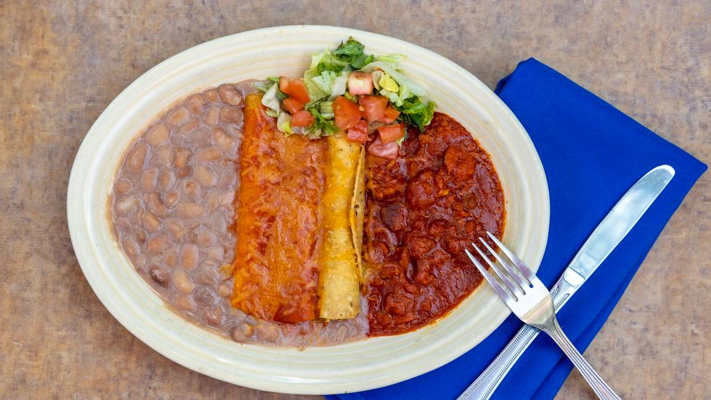 Combination Plate 1 · Rolled beef or chicken taco, tamale, red chile cheese enchilada, chile con carne and pinto beans.