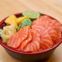 Salmon Sashimi Bowl · The Salmon Sashimi Bowl contains rice and mixed greens. It contains 1 scoop of raw salmon po...
