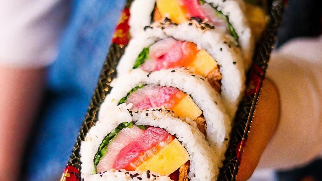 Mosaic Roll · The Mosaic Roll is a 5 piece set which contains raw salmon, raw tuna, raw hamachi, inari, tamago, green onions, and crab salad. The Mosaic Roll contains complimentary ginger and wasabi.