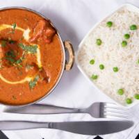 Chicken Tikka Masala · Tandoor chicken breast cooked with bell peppers, cashew nuts, onion, fresh tomatoes, cream, ...
