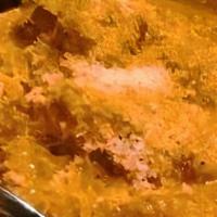Chicken Curry · Boneless chicken thigh chops cooked with fresh tomatoes, onions, ginger, garlic, cilantro, r...