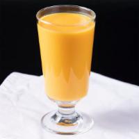 Mango Lassi · Fresh yogurt blended with mangoes and house spices.