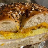 Breakfast Bagel Sandwich · Black forest ham, cheddar cheese and scrambled egg with cream cheese on your choice of toast...