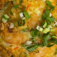 House Special Egg Foo Young · Includes BBQ pork, shrimp, chicken and vegetables with yellow gravy sauce.