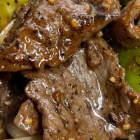 Pepper Beef In Black Bean Sauce · Sliced beef sauteed bell peppers, carrots and onion. Spicy.