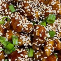 Sesame Chicken · Sauteed crispy chicken with sesame seeds and chef's special sauce.