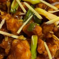 Ginger Chicken · Crispy tender chicken sauteed with green onion and ginger.