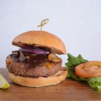 Veggie Steakhouse Burger · Beyond burger patty topped with cheddar, red onions, mushrooms and steak sauce on a brioche ...