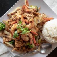 Combination Stir Fry · Chicken, Shrimp, Tofu, Onions, Broccoli, Carrots. Rice on the side.