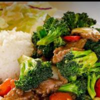 Broccoli Beef · Served with steamed rice and salad.