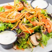House Salad · Mixed greens, carrot, mushrooms, and tomato with house-made balsamic vinaigrette or ranch.