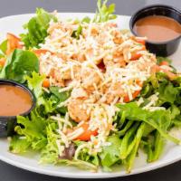 Bbq Chicken Salad · Mixed greens and spinach, bbq chicken, sharp white cheddar, and tomato white house-made bals...