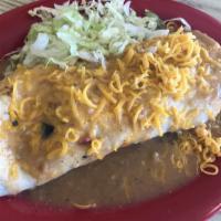 Juarez Burrito · One scrambled egg, potatoes, cheese and chile, choice of bacon, chorizo or sausage.