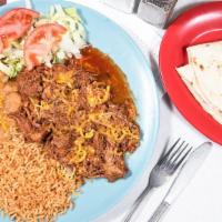 Carne Adovada Plate · This is our signature slow cooked pork. a hearty serving with red chile smothered on top, se...
