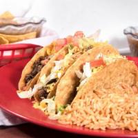 Ground Beef Taco Plate · Three crisp ground beef tacos. Plate served with beans, papas, and a tortilla