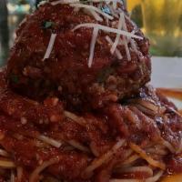 Spaghetti With Giant Meatball · Spaghetti with a giant meatball, smothered in marinara sauce.