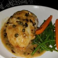 Chicken Picatta (Per One) · Sautéed chicken breast, lemon sauce, capers, shallots and white wine, served with mashed pot...