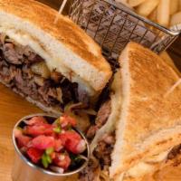 Pot Roast Beef Sandwich · Shredded beef, caramelized onions, served on sour dough.