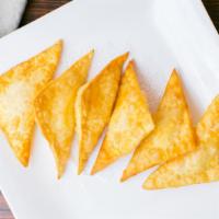 Crab Rangoon · Fried wanton filled with crab meat and cream cheese. Served with sweet and sour sauce.