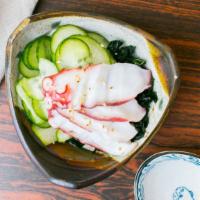 Sunomono · Sweet vinegar salad with seaweed and cucumber, with shrimp or octopus.