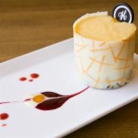 Passion · Passion fruit mousse with a raspberry mousse center atop a chocolate-buttermilk cake. Wrappe...