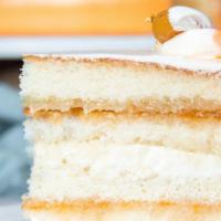 Apricot White Velvet · Chamomile & honey-soaked white buttermilk cake, apricot preserves, chamomile- vanilla bean p...