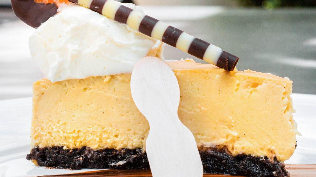 Tangerine & Vanilla Bean Cheesecake · Our famous NY Cheesecake with tangerines & vanilla bean, chocolate cookie crust, finished with vanilla whipped cream
