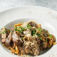 Beef Stroganoff · Comes with sour cream, garlic cloves, beef, mushrooms, and onions.