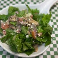 House Salad · Comes with tomato, onions, carrots, arugula and house dressing.